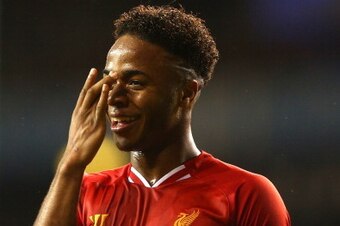 LONDON, ENGLAND - DECEMBER 15:  Raheem Sterling of Liverpool celebrates scoring their fifth goal during the Barclays Premier League match between Tottenham Hotspur and Liverpool at White Hart Lane on December 15, 2013 in London, England.  (Photo by Paul G