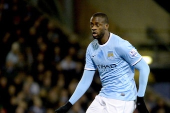 WEST BROMWICH, ENGLAND - DECEMBER 04:  Yaya Toure of Manchester City in action during the Barclays Premier League match between West Bromwich Albion and Manchester City at The Hawthorns on December 4, 2013 in West Bromwich, England.  (Photo by Ross Kinnai