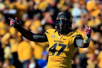 COLUMBIA, MO - OCTOBER 19:  Defensive lineman Kony Ealy #47 of the Missouri Tigers reacts after a sack of quarterback Tyler Murphy #3 of the Florida Gator sduring the game at Faurot Field/Memorial Stadium on October 19, 2013 in Columbia, Missouri.  (Photo