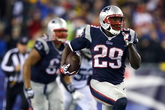 FOXBORO, MA - JANUARY 11:  LeGarrette Blount #29 of the New England Patriots runs the ball against the Indianapolis Colts during the AFC Divisional Playoff game at Gillette Stadium on January 11, 2014 in Foxboro, Massachusetts.  (Photo by Al Bello/Getty I