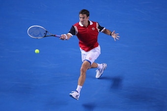 MELBOURNE, AUSTRALIA - JANUARY 17:  Tommy Robredo of Spain plays a forehand in his third round match against Richard Gasquet of France during day five of the 2014 Australian Open at Melbourne Park on January 17, 2014 in Melbourne, Australia.  (Photo by Sc