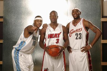 DENVER - FEBRUARY 18:  (L-R) Carmelo Anthony #15, Dwyane Wade #3 and LeBron James #23 of the Rookie Team pose for a portrait prior to the got milk? Rookie Challenge during 2005 NBA All-Star Weekend at Pepsi Center on February 18, 2005 in Denver, Colorado.