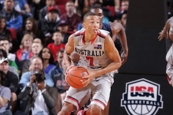 PORTLAND, OR - APRIL 20: Dante Exum #7 on the World Select Team drives against the USA Junior Select Team during the game on April 20, 2013 at the Rose Garden Arena in Portland, Oregon. NOTE TO USER: User expressly acknowledges and agrees that, by downloa