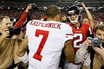ATLANTA, GA - JANUARY 20:  Matt Ryan (R) #2 of the Atlanta Falcons congratulates Colin Kaepernick #7 of the San Francisco 49ers after the 49ers won 28-24 in the NFC Championship game at the Georgia Dome on January 20, 2013 in Atlanta, Georgia.  (Photo by 