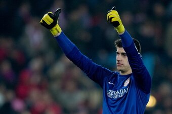 MADRID, SPAIN - JANUARY 11:  Goalkeeper Thibaut Courtois of Atletico de Madrid greets the audience after the La Liga match between Club Atletico de Madrid and FC Barcelona at Vicente Calderon Stadium on January 11, 2014 in Madrid, Spain.  (Photo by Gonzal