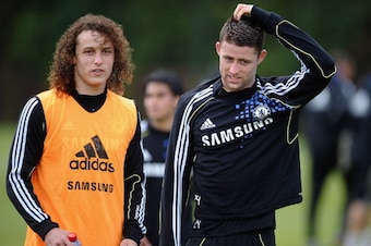 COBHAM, ENGLAND - MAY 15: David Luiz (L) and Gary Cahill of Chelsea walk off the field after training at Chelsea Training Ground on May 15, 2012 in Cobham, England.  (Photo by Laurence Griffiths/Getty Images)