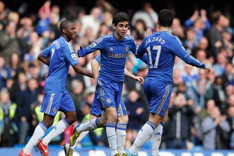 LONDON, ENGLAND - APRIL 07:  Oscar (C) and Eden Hazard of Chelsea celebrate the equalising goal, an own goal by Matthew Kilgallon of Sunderland during the Barclays Premier League match between Chelsea and Sunderland at Stamford Bridge on April 7, 2013 in 