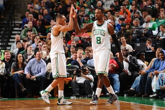 BOSTON, MA - NOVEMBER 27: Avery Bradley #0 and Jeff Green #8 of the Boston Celtics high five during the game against the Memphis Grizzlies on November 27, 2013 at the TD Garden in Boston, Massachusetts.  NOTE TO USER: User expressly acknowledges and agree