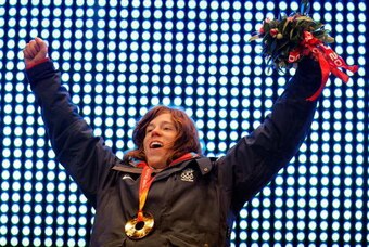 TURIN, ITALY - FEBRUARY 12:  Men's Halfpipe gold medalist Shaun White celebrates his gold medal during the Medal Ceremony on Day 2 of the Turin 2006 Winter Olympic Games  at the Medals Plaza on February 12, 2006 in Turin, Italy. (Photo by Elsa/Getty Image