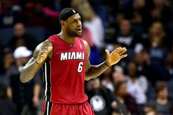 CHARLOTTE, NC - JANUARY 18:  LeBron James #6 of the Miami Heat reacts to the crowd during their game against the Charlotte Bobcats at Time Warner Cable Arena on January 18, 2014 in Charlotte, North Carolina.  NOTE TO USER: User expressly acknowledges and 