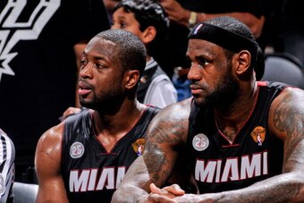 SAN ANTONIO, TX - JUNE 16: LeBron James #6 and Dwyane Wade #3 of the Miami Heat sit on the bench during a timeout against the San Antonio Spurs in Game Five of the 2013 NBA Finals on June 16, 2013 at AT&T Center in San Antonio, Texas. NOTE TO USER: User e