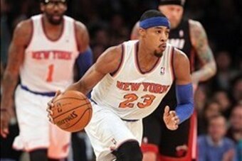 Jan 9, 2014; New York, NY, USA; New York Knicks shooting guard Toure' Murry (23) controls the ball against the Miami Heat during the fourth quarter of a game at Madison Square Garden. Mandatory Credit: Brad Penner-USA TODAY Sports