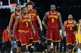 Jan 14, 2014; Los Angeles, CA, USA; Cleveland Cavaliers shooting guard Dion Waiters (3), center Anderson Varejao (17),  small forward Luol Deng (9) and point guard Kyrie Irving (2) walk off the court in the fourth quarter of the game against the Los Angel