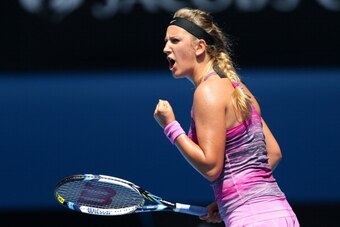 MELBOURNE, AUSTRALIA - JANUARY 20:  Victoria Azarenka of Belarus celebrates a point in her fourth round match against Sloane Stephens of the United States during day eight of the 2014 Australian Open at Melbourne Park on January 20, 2014 in Melbourne, Aus
