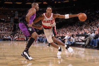 2 Jan 2002:  Forward Scottie Pippen #33 of the Portland Trail Blazers drives past guard Vince Carter #15 of the Toronto Raptors during the NBA game at the Rose Garden in Portland, Oregon.  The Raptors defeated the Trail Blazers 95-84. NOTE TO USER: User e