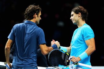LONDON, ENGLAND - NOVEMBER 10:  Rafael Nadal of Spain is congratulated by Roger Federer of Switzerland after their men's singles semi-final match during day seven of the Barclays ATP World Tour Finals at O2 Arena on November 10, 2013 in London, England.  