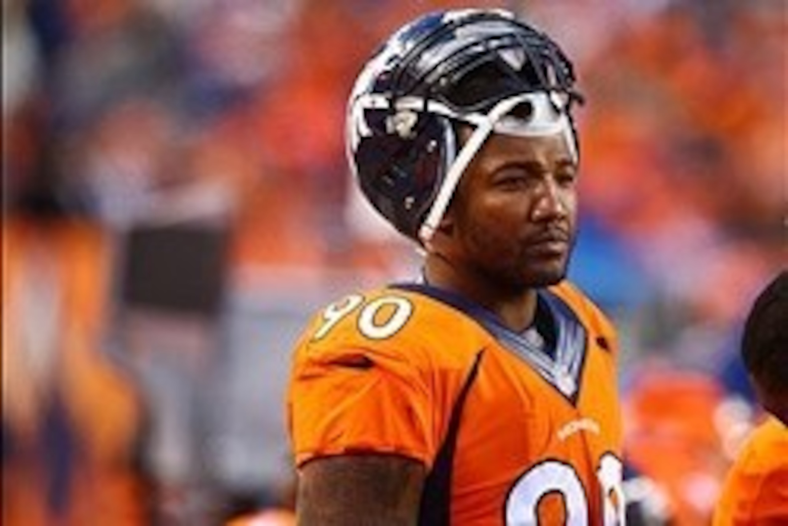 Jan 12, 2014; Denver, CO, USA; Denver Broncos defensive end Shaun Phillips (90) against the San Diego Chargers during the 2013 AFC divisional playoff football game at Sports Authority Field at Mile High. Mandatory Credit: Mark J. Rebilas-USA TODAY Sports