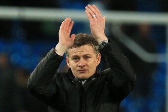 MANCHESTER, ENGLAND - JANUARY 18:  Ole Gunnar Solskjaer the Cardiff manager acknowledges the travelling fans following their 4-2 defeat during the Barclays Premier League match between Manchester City and Cardiff City at the Etihad Stadium on January 18, 