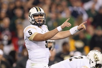 GLENDALE, AZ - JANUARY 01:  Quarterback Blake Bortles #5 of the UCF Knights prepares to snap the football during the Tostitos Fiesta Bowl against the Baylor Bears at University of Phoenix Stadium on January 1, 2014 in Glendale, Arizona. The Knights defeat