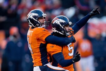 DENVER, CO - DECEMBER 8:  Place kicker Matt Prater #5 of the Denver Broncos celebrates a 64-yard field goal for a new NFL record on a hold by Britton Colquitt #4 during the second quarter against the Tennessee Titans at Sports Authority Field Field at Mil