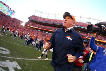 DENVER, CO - JANUARY 19:  Head coach John Fox of the Denver Broncos celebrates after they defeated the New England Patriots 26 to 16 during the AFC Championship game at Sports Authority Field at Mile High on January 19, 2014 in Denver, Colorado.  (Photo b