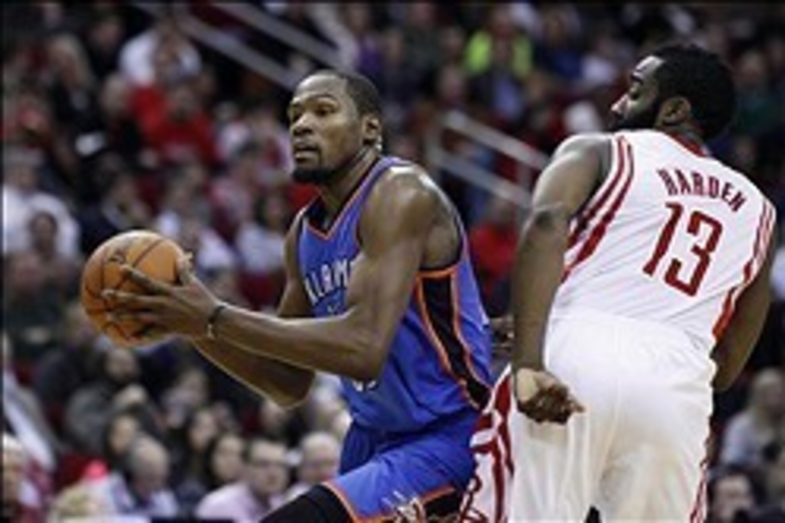 Jan 16, 2014; Houston, TX, USA; Oklahoma City Thunder small forward Kevin Durant (35) drives to the basket past Houston Rockets shooting guard James Harden (13) during the third quarter at Toyota Center. Mandatory Credit: Andrew Richardson-USA TODAY Sport