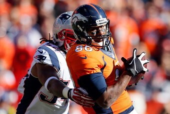 DENVER, CO - JANUARY 19:  Julius Thomas #80 of the Denver Broncos catches a pass against Dont'a Hightower #54 of the New England Patriots during the AFC Championship game at Sports Authority Field at Mile High on January 19, 2014 in Denver, Colorado.  (Ph
