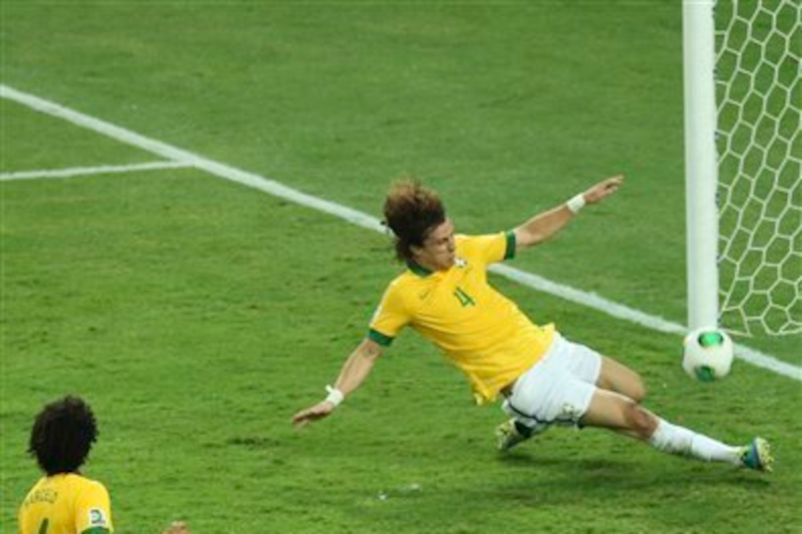David Luiz blocks Pedro's goalbound effort during the Confederations Cup final with the score at 1-0. Brazil went on to beat Spain 3-0