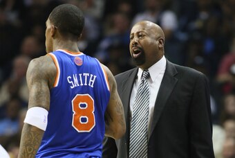 Nov 16, 2012; Memphis, TN, USA; New York Knicks head coach Mike Woodson talks to guard J.R. Smith (8) during the game against the Memphis Grizzlies at the FedEx Forum. Memphis defeated New York 105-95. Mandatory Credit: Nelson Chenault-USA TODAY Sports