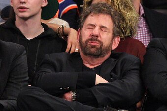 Dec 25, 2013; New York, NY, USA; New York Knicks executive chairman James L. Dolan reacts during the fourth quarter of a game against the Oklahoma City Thunder at Madison Square Garden. The Thunder defeated the Knicks 123-94. Mandatory Credit: Brad Penner