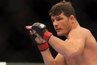 Apr 27, 2013; Newark, NJ, USA; Michael Bisping (red gloves) competes against Alan Belcher (not pictured) during UFC 159 at the Prudential Center. Mandatory Credit: Brad Penner-USA TODAY Sports