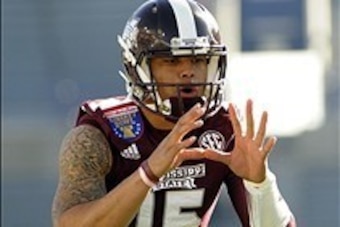 Dec 31, 2013; Memphis, TN, USA; Mississippi State Bulldogs quarterback Dak Prescott (15) warms up before the game against the Rice Owls at Liberty Bowl Memorial Stadium. Mandatory Credit: Justin Ford-USA TODAY Sports