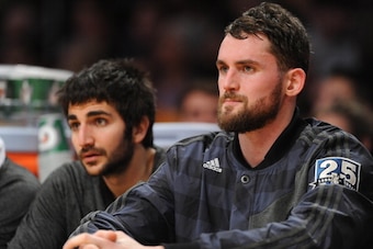 LOS ANGELES, CA - DECEMBER 20: Ricky Rubio #9 and Kevin Love #42 of the Minnesota Timberwolves look on from the bench during a game against the Los Angeles Lakers at Staples Center on December 20, 2013 in Los Angeles, California. NOTE TO USER: User expres