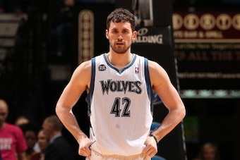 MINNEAPOLIS, MN - JANUARY 18: Kevin Love #42 of the Minnesota Timberwolves stands on the court against the Utah Jazz on January 18, 2014 at Target Center in Minneapolis, Minnesota. NOTE TO USER: User expressly acknowledges and agrees that, by downloading 