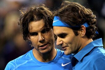 INDIAN WELLS, CA - MARCH 17:  Rafael Nadal of Spain congratulates Roger Federer of Switzerland after their match during the semifinals of the BNP Paribas Open at the Indian Wells Tennis Garden on March 17, 2012 in Indian Wells, California.  (Photo by Matt
