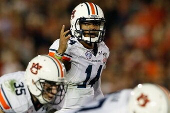 PASADENA, CA - JANUARY 06:  Quarterback Nick Marshall #14 of the Auburn Tigers calls a play against the Florida State Seminoles during the 2014 Vizio BCS National Championship Game at the Rose Bowl on January 6, 2014 in Pasadena, California.  (Photo by Ke