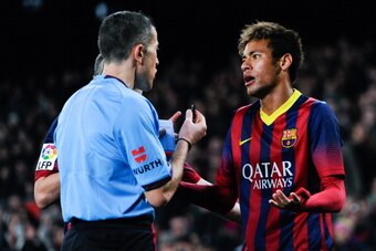 BARCELONA, SPAIN - DECEMBER 14:  Neymar of FC Barcelona argues with the referee after being shown a yellow card during the La Liga match between FC Barcelona and Villarreal CF at Camp Nou on December 14, 2013 in Barcelona, Spain.  (Photo by David Ramos/Ge