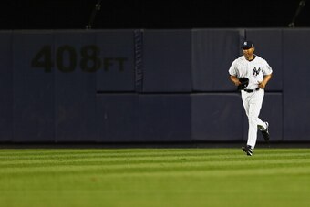 NEW YORK, NY - SEPTEMBER 26:  Mariano Rivera #42 of the New York Yankees enters the game in the eighth inning against the Tampa Bay Rays on September 26, 2013 at Yankee Stadium in the Bronx borough of New York City.  (Photo by Elsa/Getty Images)