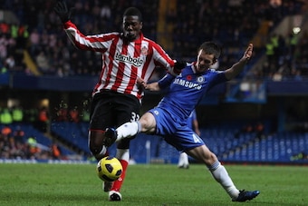 LONDON, ENGLAND - NOVEMBER 14: Asamoah Gyan of Sunderland battles with Josh McEachran of Chelsea during the Barclays Premier League match between Chelsea and Sunderland at Stamford Bridge on November 14, 2010 in London, England. (Photo by Scott Heavey/G LONDON, ENGLAND - NOVEMBER 14: Asamoah Gyan of Sunderland battles with Josh McEachran of Chelsea during the Barclays Premier League match between Chelsea and Sunderland at Stamford Bridge on November 14, 2010 in London, England. (Photo by Scott Heavey/G