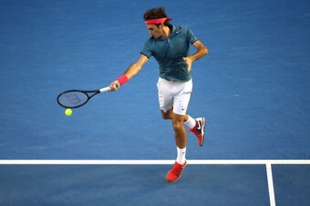 MELBOURNE, AUSTRALIA - JANUARY 22: Roger Federer of Switzerland plays a forehand in his quarterfinal match against Andy Murray of Great Britain during day 10 of the 2014 Australian Open at Melbourne Park on January 22, 2014 in Melbourne, Australia. (Pho MELBOURNE, AUSTRALIA - JANUARY 22: Roger Federer of Switzerland plays a forehand in his quarterfinal match against Andy Murray of Great Britain during day 10 of the 2014 Australian Open at Melbourne Park on January 22, 2014 in Melbourne, Australia. (Pho