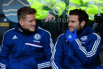 HULL, ENGLAND - JANUARY 11:  Substitutes Andre Schurrle and Juan Mata of Chelsea on the bench during the Barclays Premier League match between Hull City and Chelsea at KC Stadium on January 11, 2014 in Hull, England.  (Photo by Laurence Griffiths/Getty Im