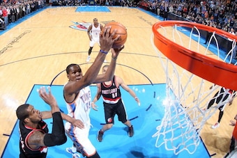 OKLAHOMA CITY, OK - JANUARY 21: Kevin Durant #35 of the Oklahoma City Thunder taking a shot during a game against the Portland Trailblazers  on January 21, 2014 at the Chesapeake Energy Arena in Oklahoma City, Oklahoma. NOTE TO USER: User expressly acknow