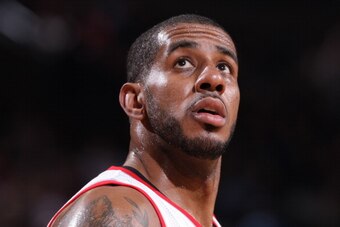 PORTLAND, OR - JANUARY 4:  LaMarcus Aldridge #12 of the Portland Trail Blazers looks up against the Philadelphia 76ers on January 4, 2014 at the Moda Center Arena in Portland, Oregon. NOTE TO USER: User expressly acknowledges and agrees that, by downloadi