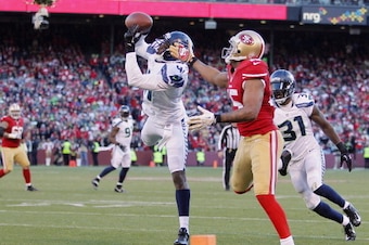SAN FRANCISCO, CA - DECEMBER 08:  Byron Maxwell #41 of the Seattle Seahawks intercepts a pass intended for Michael Crabtree #15 of the San Francisco 49ers at the one yard line in the third quarter on December 8, 2013 at Candlestick Park in San Francisco, 