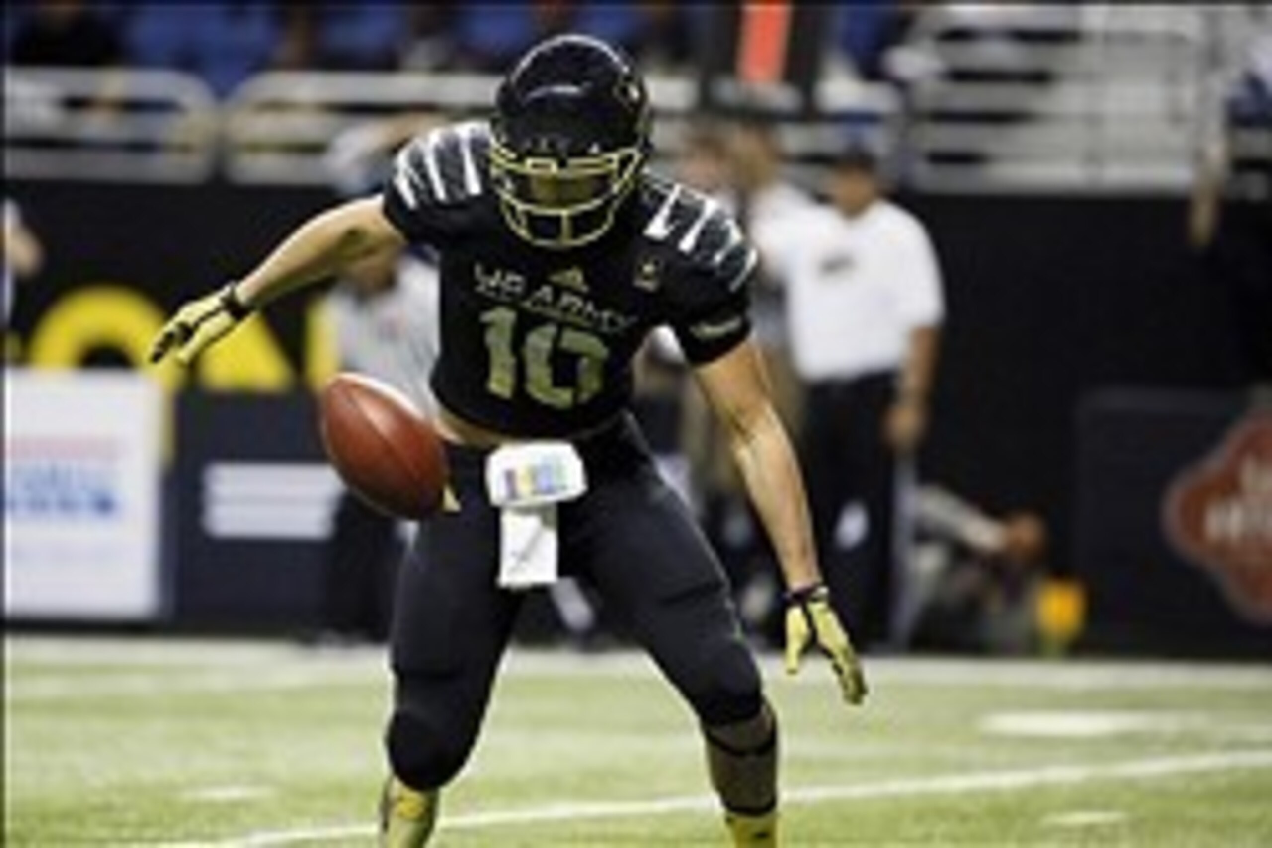 Jan 4, 2014; San Antonio, TX, USA; East quarterback Jacob Park (10) recovers his own fumble during U.S. Army All-American Bowl high school football game at the Alamodome. Mandatory Credit: Soobum Im-USA TODAY Sports
