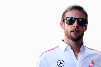AUSTIN, TX - NOVEMBER 17:  Jenson Button of Great Britain and McLaren attends the drivers parade before the United States Formula One Grand Prix at Circuit of The Americas on November 17, 2013 in Austin, United States.  (Photo by Mark Thompson/Getty Image