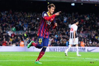 BARCELONA, SPAIN - DECEMBER 17:  Neymar of FC Barcelona celebrates after scoring his team's third goal during the Copa del Rey round of 32 second leg match between FC Barcelona and Cartagena at Camp Nou on December 17, 2013 in Barcelona, Spain.  (Photo by