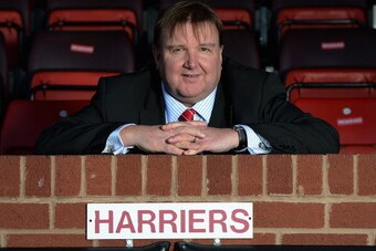 KIDDERMINSTER, ENGLAND - JANUARY 23: Kidderminster chairman Mark Serrell poses during the Kidderminster Harriers press conference at Aggborough Stadium on January 23, 2014 in Kidderminster, England.  (Photo by Michael Regan/Getty Images)