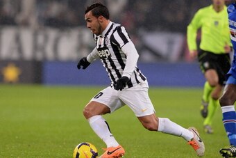 TURIN, ITALY - JANUARY 18:  Carlos Tevez of Juventus in action during the Serie A match between Juventus and UC Sampdoria at Juventus Arena on January 18, 2014 in Turin, Italy.  (Photo by Claudio Villa/Getty Images)