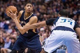 Jan 11, 2014; Dallas, TX, USA; Dallas Mavericks power forward Brandan Wright (34) guards New Orleans Pelicans power forward Anthony Davis (23) during the first half at the American Airlines Center. Mandatory Credit: Jerome Miron-USA TODAY Sports